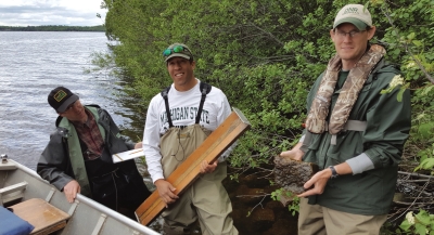 Brian Roth (center) with MDNR fisheries biologists Troy Zorn (left) and John Bauman (right). Zorn is heavily involved in the collection and maintenance of MDNR's database on fish in Bay de Noc and an active member of the research team. Bauman works out of MDNR's Escanaba Field Station.