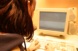 Photo of girl using a computer