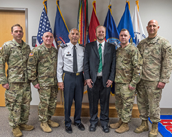 (From left) Michigan Army National Guard  Chief Warrant Officer 2 Ron Hatchew, State Family Program Director, ; Lieutenant Colonel Gregory Cooper, Deputy Director for Personnel; Major General Gregory Vadnais, Adjutant General; Adrian Blow, MSU Professor; Major Nick Anderson, former State Family Program Director, Colonel Mark Tellier, Chief of Staff, Michigan Army  National Guard.