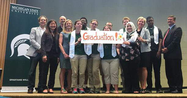 The inaugural Spartan Project SEARCH graduating class gathers for a group photo after commencement festivities.
