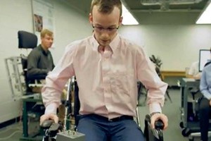 Ph.D. student, Garrett Weidig, demonstrates new wheelchair capabilities in Bush's mechanical engineering lab