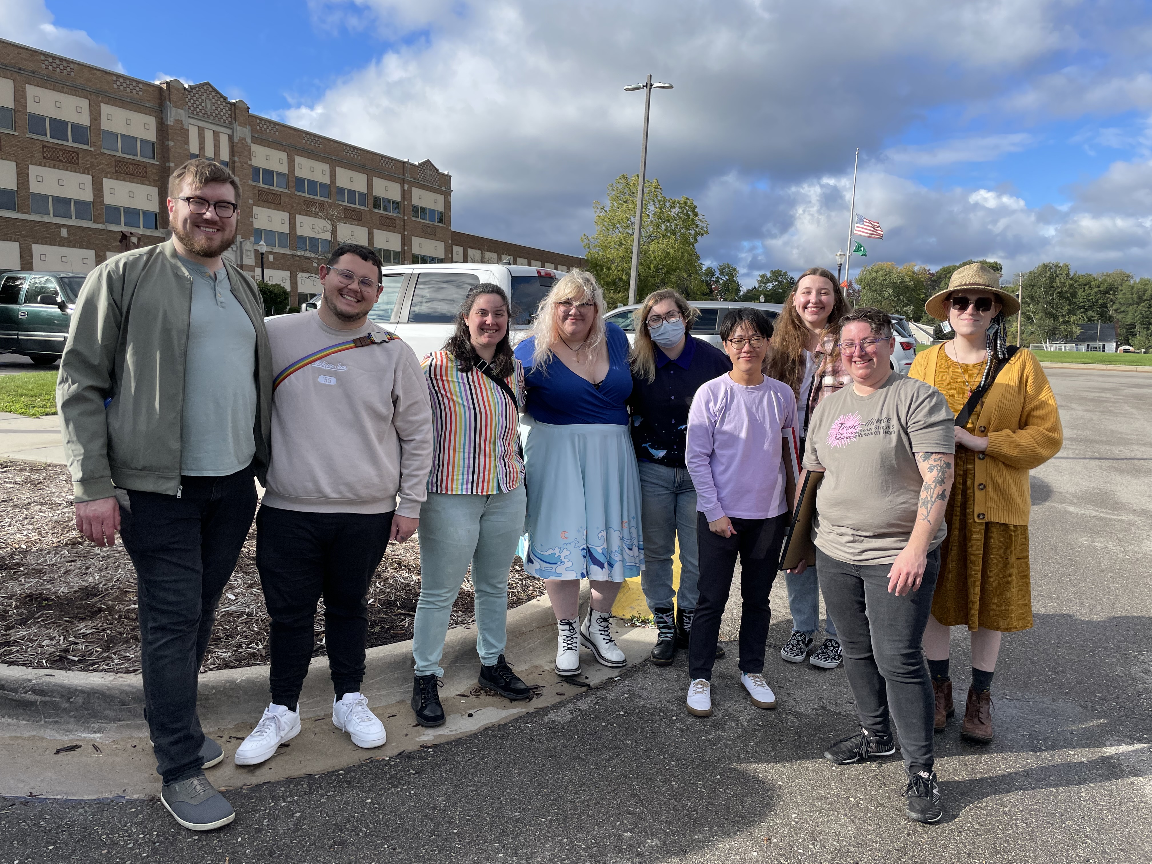 Members of the Trans-ilience research team, board members, and volunteers pause for a group photo during the 'Queer and Trans Joy Celebration' event.