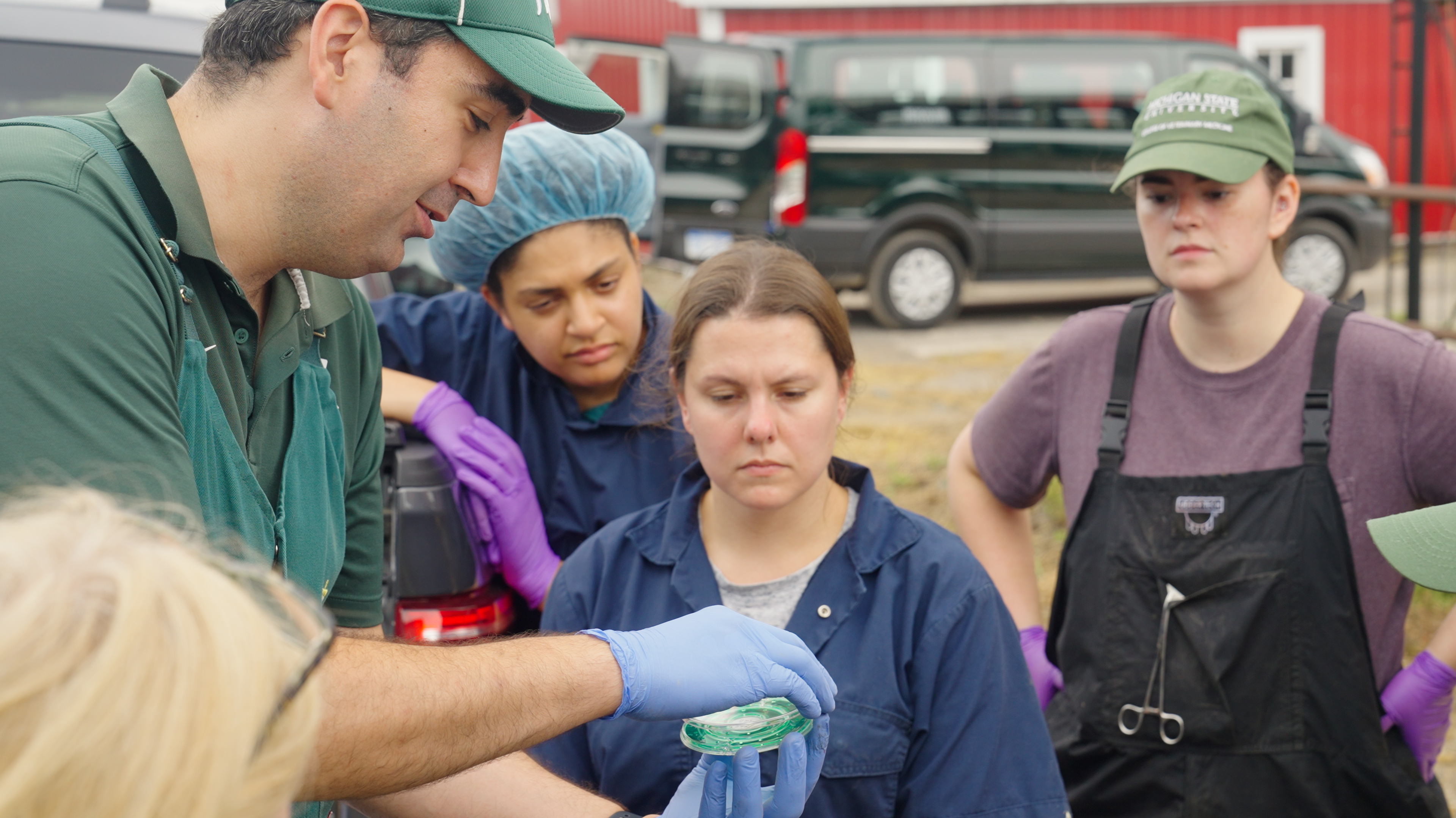 Abuelo demonstrates instruments used to evaluate the transfer of passive immunity to calves, which is key to their short- and long-term health.