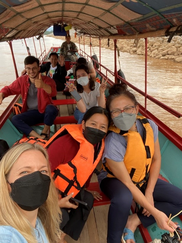 Mekong Culture WELL team and students on a Mekong boat at the Thai/Lao border