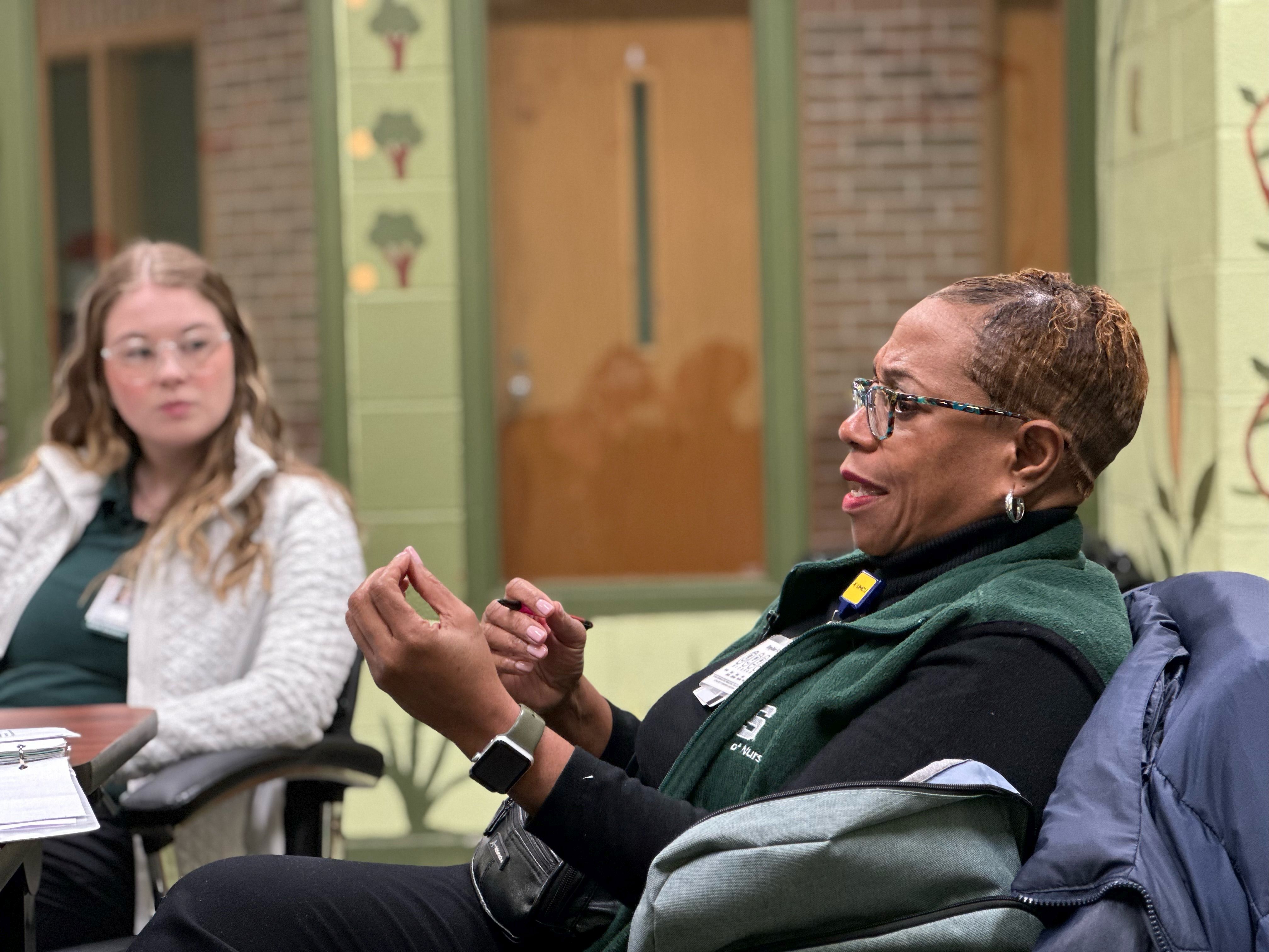Rhonda Conner-Warren talks with students at Focus: HOPE in Detroit.