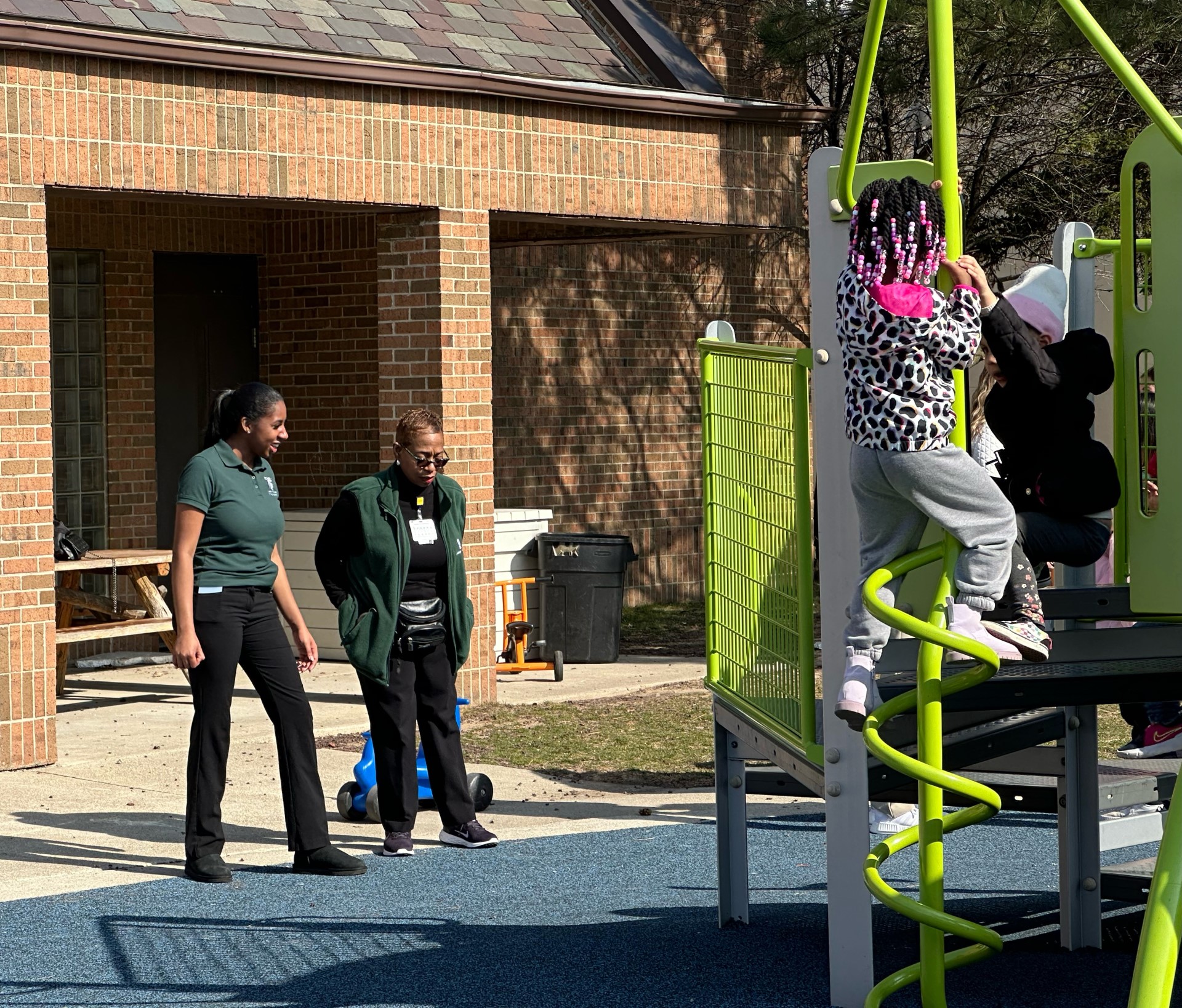 Rakala Todd chats with Professor Rhonda Conner-Warren on the playground