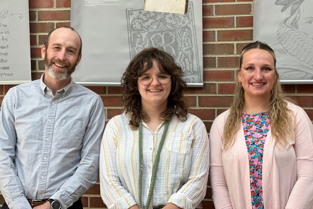 Associate Professor Justin Simard is joined by Cass Technical High School teacher Taylor Sastre and law student Hannah Gates at the MSU College of Law. Sastre and her students met the dean and other faculty members during a campus visit in April.