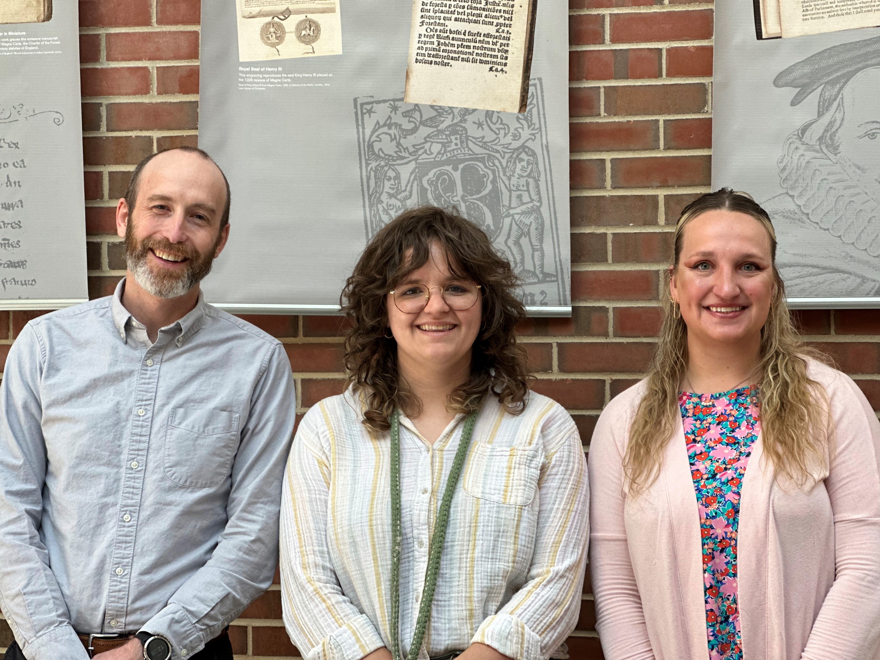 Associate Professor Justin Simard is joined by Cass Technical High School teacher Taylor Sastre and law student Hannah Gates at the MSU College of Law. Sastre and her students met the dean and other faculty members during a campus visit in April.