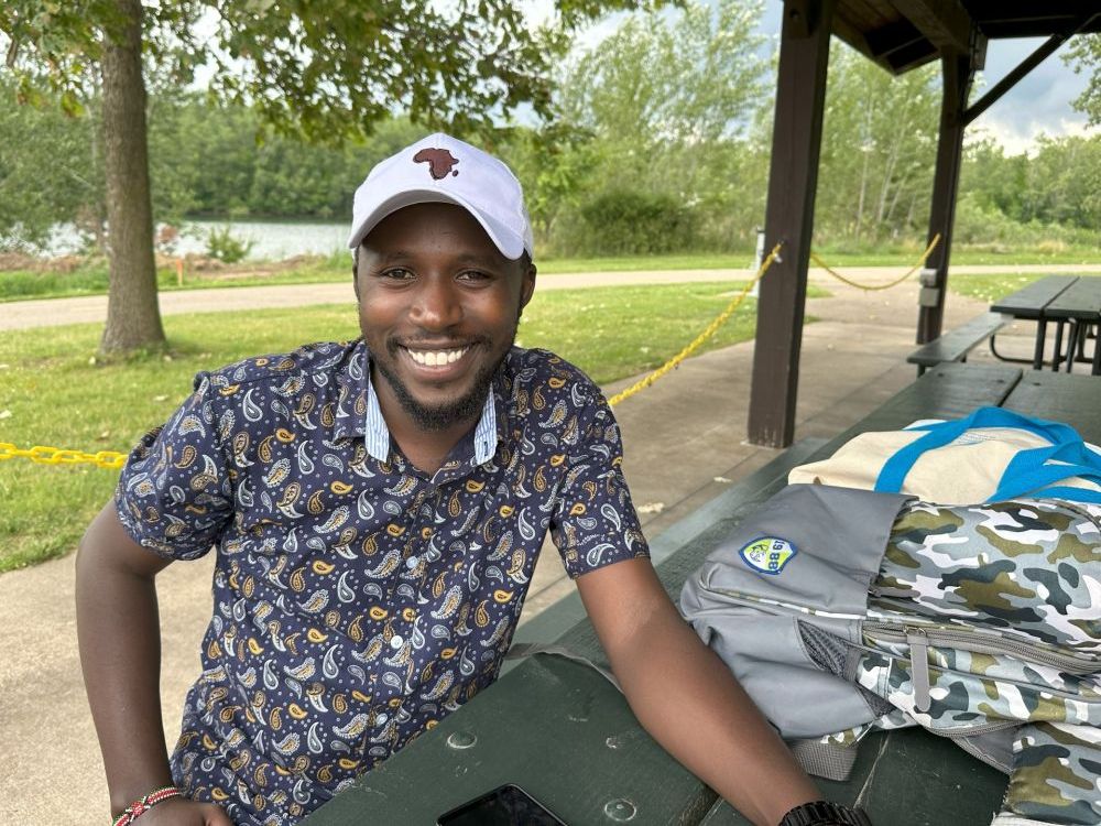 Pharis Jane, Mandela Washington Fellowship program participant, poses for a picture during a picnic at Hawk Island Park in Lansing.