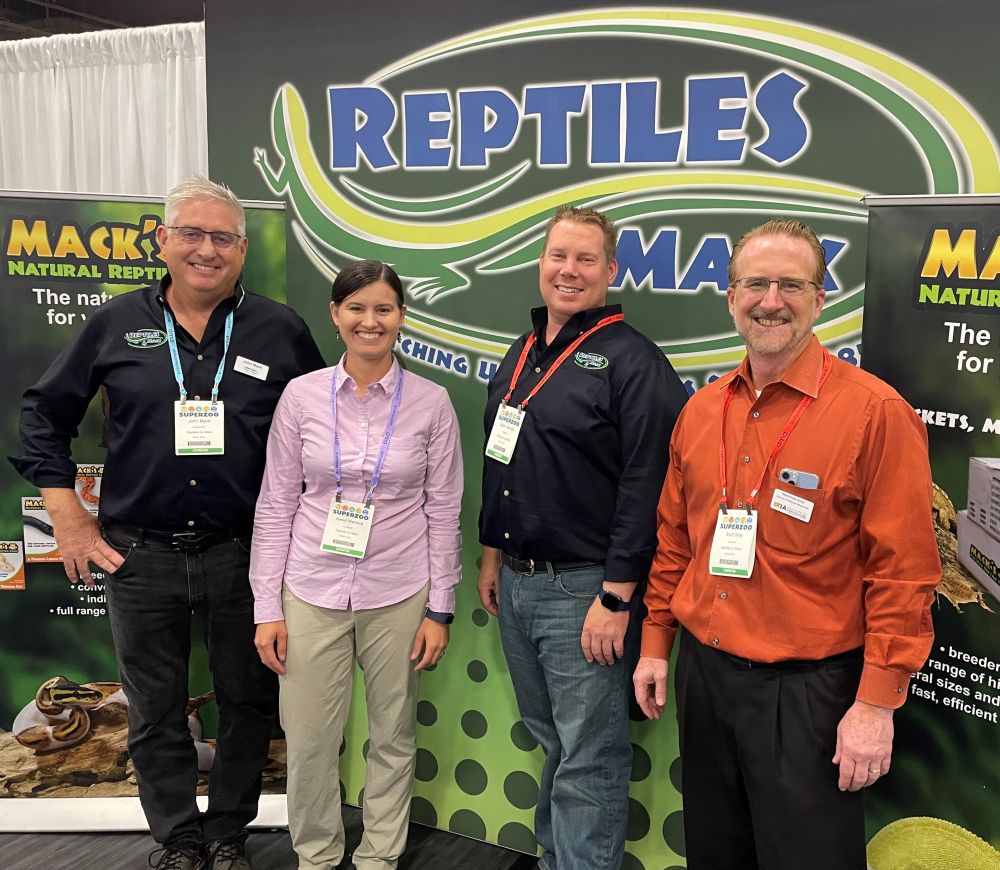 Researchers connected with pet owners and industry representatives at SuperZoo, North America's largest pet trade show. From left: John Mack, Reptiles by Mack; Alexa Warwick; Matt George, Reptiles by Mack; and Matthew Gray, University of Texas.