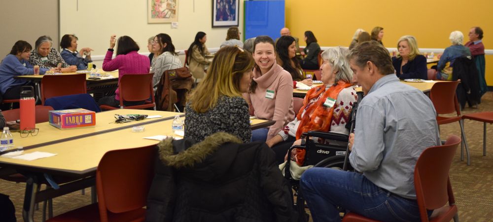 John Waller chats with Generations Connect participants at a fall gathering.