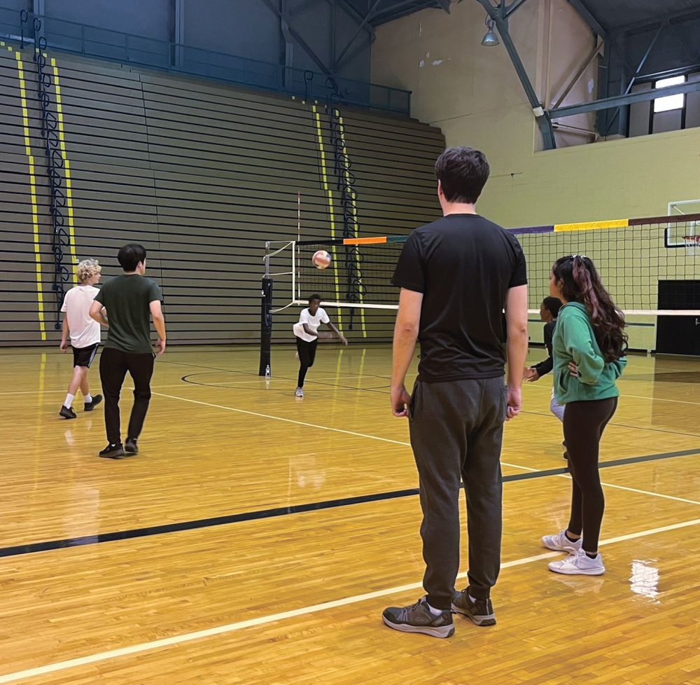 MSU students on Malete's research team layer life lessons into sport activities like volleyball, soccer, and basketball at an after-school program for Lansing high school students.