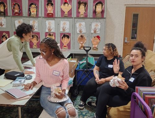 Family Voices student team members Simone Bibbs, Kennedy Perkins, Anneliese Samples, and Audrey Jones prepare to meet with parent and child groups.