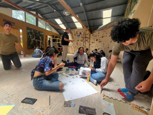Students overcame language barriers to create artwork expressing their concerns about the effects of pollution.