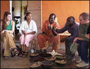 Students learn about natural dyes from Boubacar Doumbia (center), head of Groupe Kasobane Atelier in Segou, Mali. Doumbia will visit MSU next year to teach a fabric workshop with Worland and exhibit his own textiles at the MSU Museum.