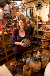 Paulette Stenzel shops at Kirabo, a Fair Trade store in East Lansing, Michigan, owned by MSU alumna Gail Catron.