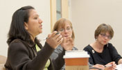 Monica Kwasnik, Linda Hunt, and Olga Hernandez-Patino discuss issues at an LLHA board meeting.