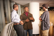 Austin Jackson (center) discusses the importance of mentoring with students A.J. Rice (left) and Zack Silverman (right).
