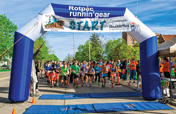 Starting lineup at the 2014 Flintstone Challenge, a 5K run/walk established by a group of MSU-FAME medical students.