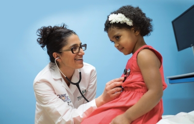 Mona Hanna-Attisha dialogues with a four-year-old Flint resident.