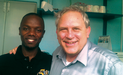 Boivin poses with Robert Tukei, a Ugandan physician who served as a medical officer on one of the malaria studies at Mulago Hospital. He came to MSU to pursue a master's degree in epidemiology through the support of the MasterCard Foundation.