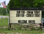 Restaurant sign advertising fresh fish, Brimley, Chippewa County.